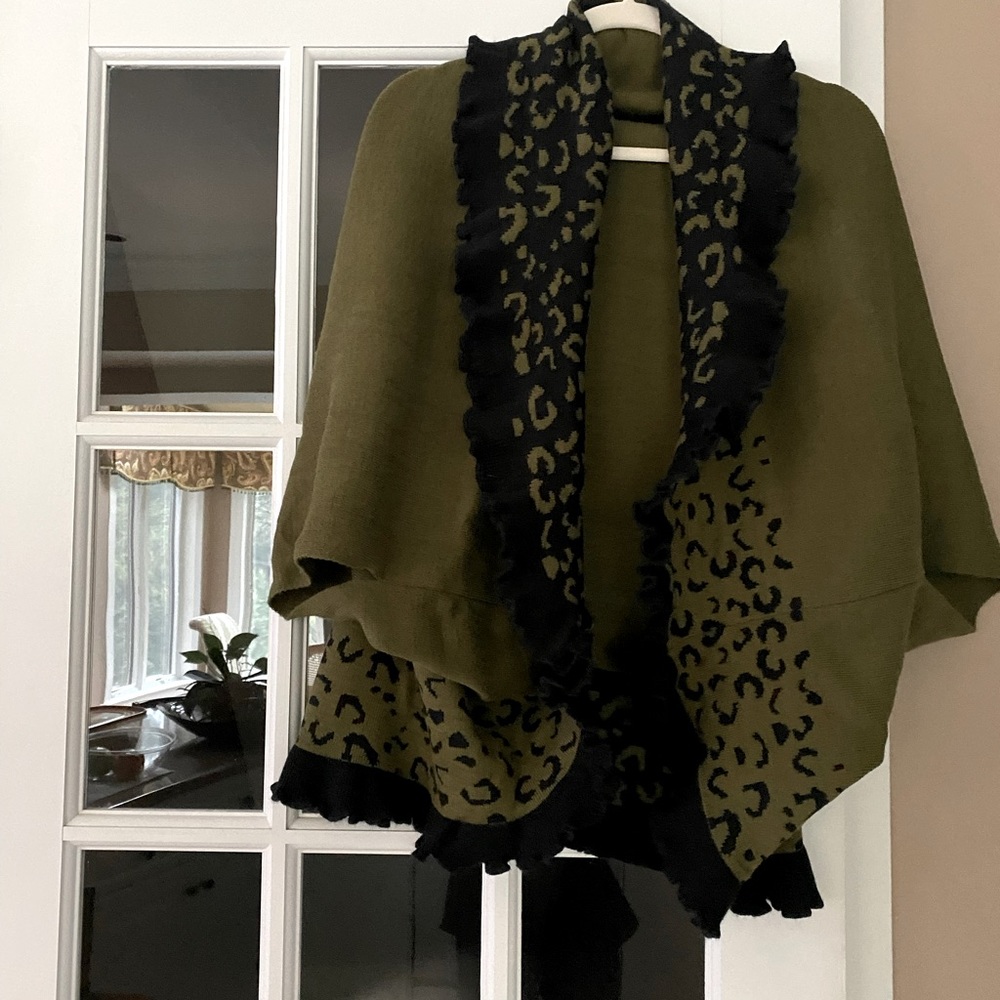 Sweater cape with arm holes